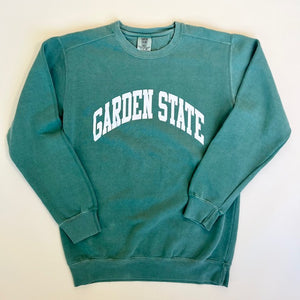 Green crewneck sweatshirt that reads "Garden State" in white letters. 