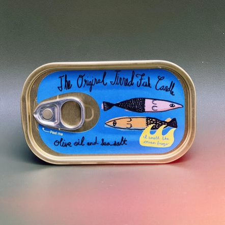 Fish tin that says "The Original Tinned Fish Candle" Olive oil & sea salt scented.