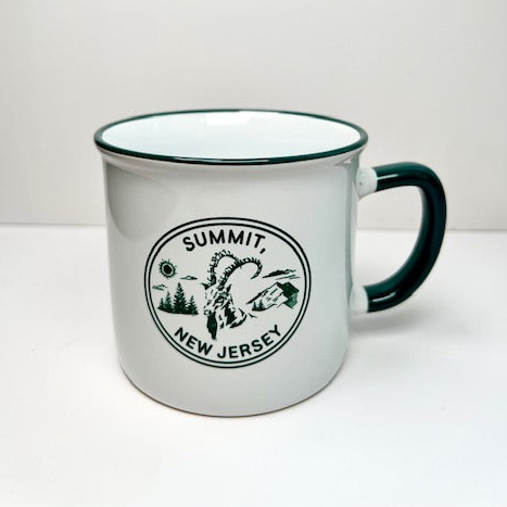 A mostly white mug with a forest green handle and ring around the top lip. In the center on the mug is a circle that reads "Summit, NJ". Within the circle is also a ram head, mountains, trees and a small sun.